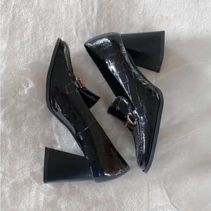 Raid heeled loafers in black patent leather